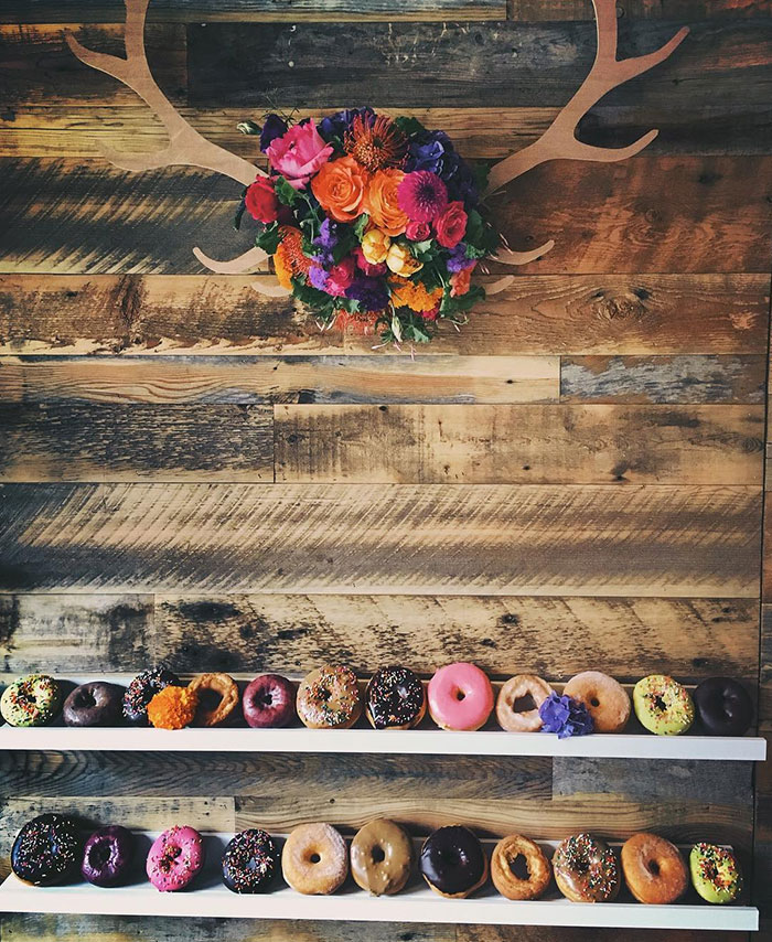Donut Walls Is The Newest Wedding Trend That Will Win Over Your Guests’ Hearts Donut Walls Is The Newest Wedding Trend That Will Win Over Your Guests’ Hearts