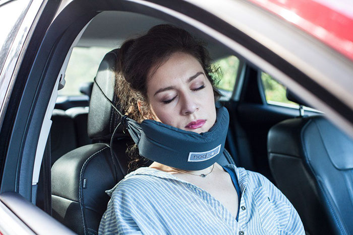 Someone Finally Invented A Head Hammock So You Could Fall Asleep On A Plane