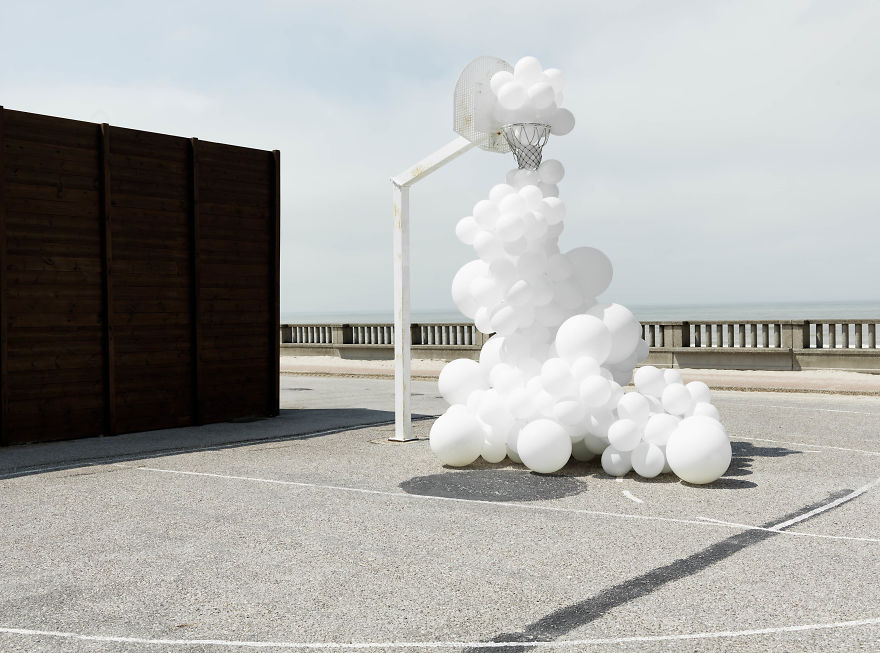White Balloons Invade Various Places In Surreal Installations By Charles Pétillon
