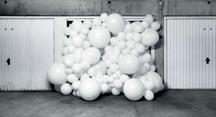 White Balloons Invade Various Places In Surreal Installations By Charles Pétillon