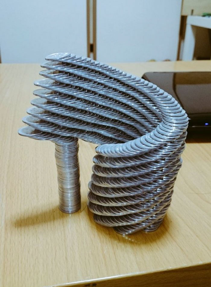This Japanese Guy&#8217;s Coin Stacking Skills Almost Defy Gravity