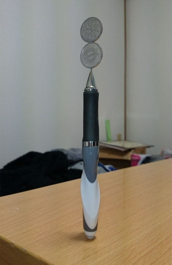 This Japanese Guy&#8217;s Coin Stacking Skills Almost Defy Gravity