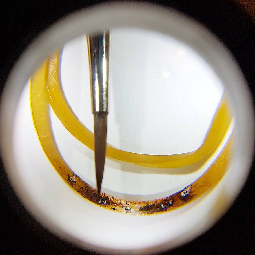 Turkish Artist Paints Unbelievably Tiny Paintings Onto Small Objects Turkish Artist Paints Unbelievably Tiny Paintings Onto Small Objects