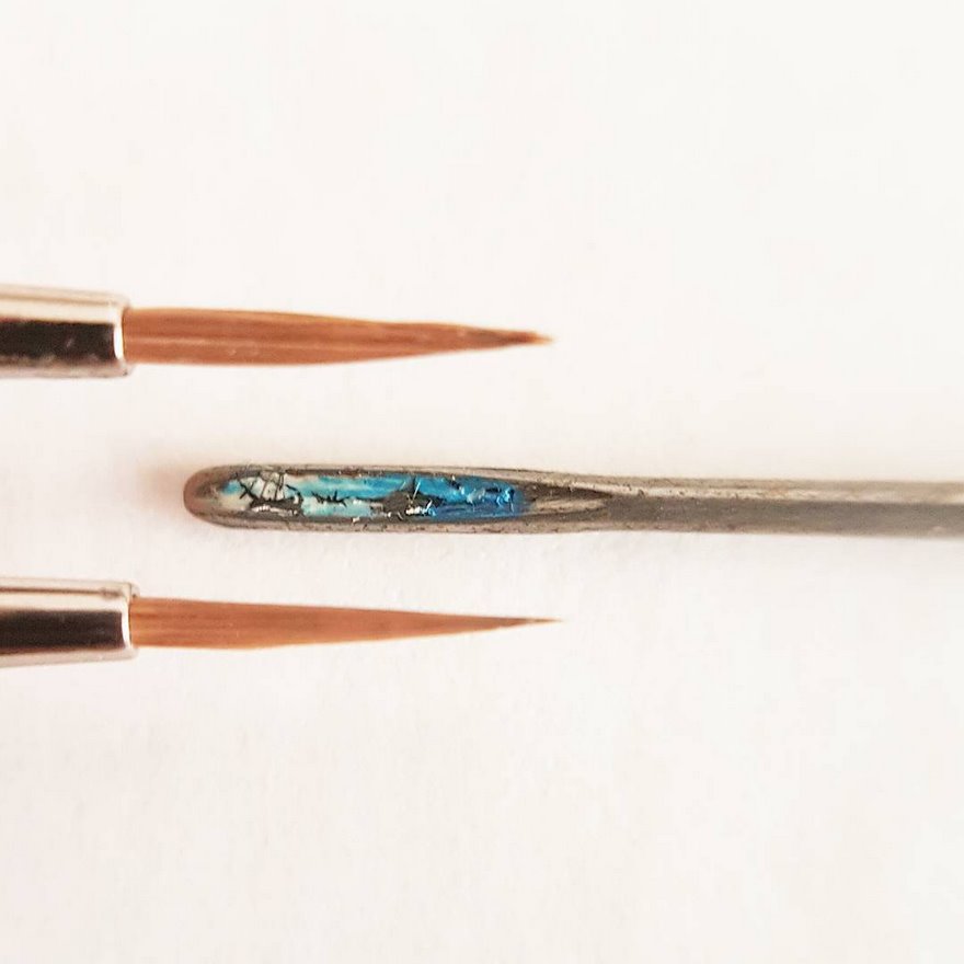 Turkish Artist Paints Unbelievably Tiny Paintings Onto Small Objects Turkish Artist Paints Unbelievably Tiny Paintings Onto Small Objects