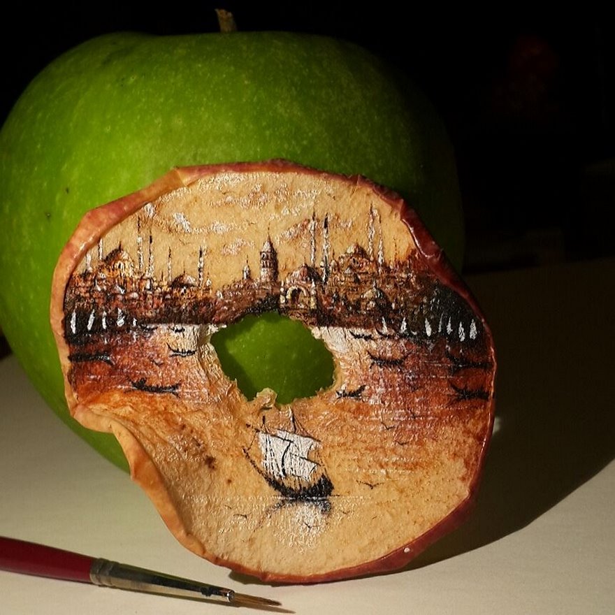 Turkish Artist Paints Unbelievably Tiny Paintings Onto Small Objects Turkish Artist Paints Unbelievably Tiny Paintings Onto Small Objects