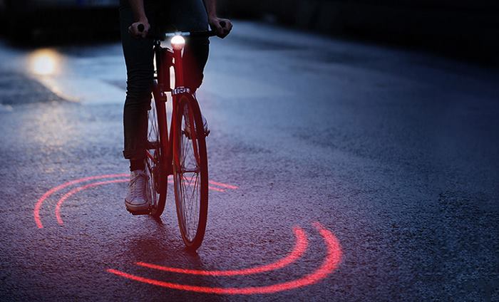 Michelin Just Made A Bike Lighting System That Protects Cyclists From Traffic Inside Its Ring Of Red Light Michelin Just Made A Bike Lighting System That Protects Cyclists From Traffic Inside Its Ring Of Red Light
