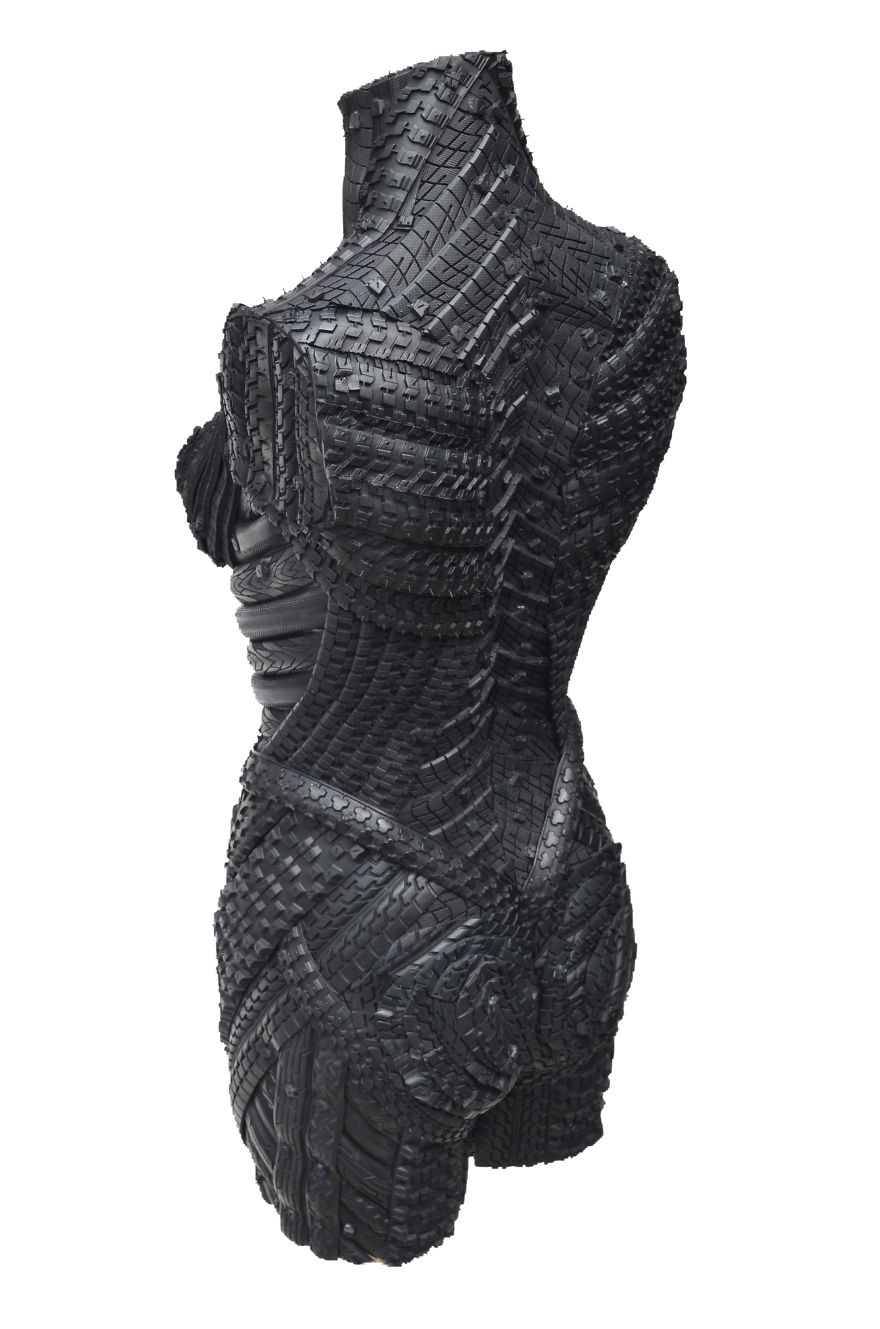 Recycled Tire Sculpture Of Female Torso