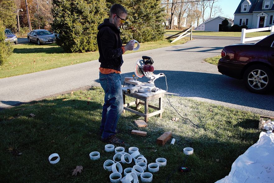 We Made A Christmas Tree From An Old Tire, A Bucket, And 40Ft Of PVC Pipe