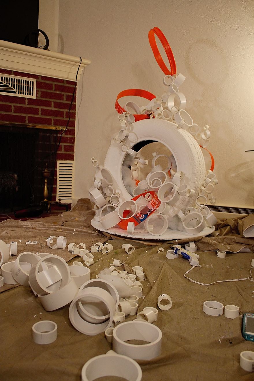 We Made A Christmas Tree From An Old Tire, A Bucket, And 40Ft Of PVC Pipe