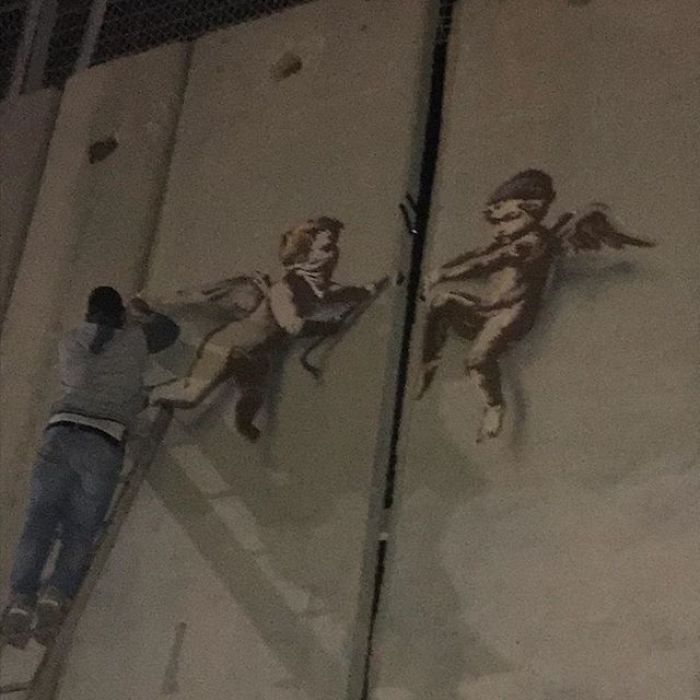 New Banksy Street Art In Palestine Reminds World That The Holidays Aren’t Happy For Everyone New Banksy Street Art In Palestine Reminds World That The Holidays Aren’t Happy For Everyone