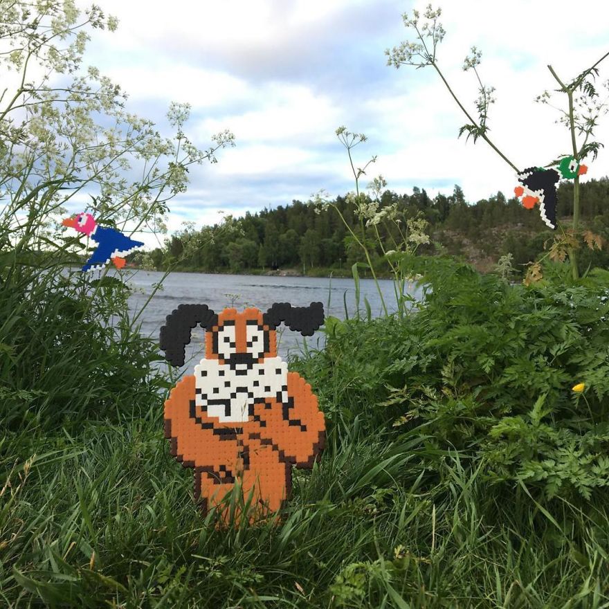 Someone Is ‘Vandalising’ Streets With Pixel Art, And The Result Is Awesome Someone Is ‘Vandalising’ Streets With Pixel Art, And The Result Is Awesome