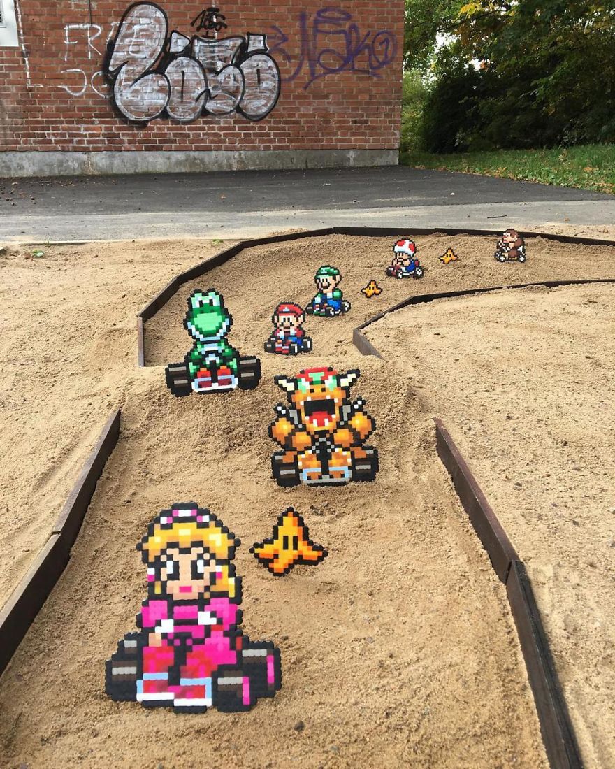 Someone Is ‘Vandalising’ Streets With Pixel Art, And The Result Is Awesome Someone Is ‘Vandalising’ Streets With Pixel Art, And The Result Is Awesome