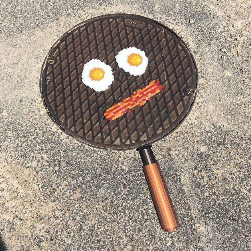 Someone Is ‘Vandalising’ Streets With Pixel Art, And The Result Is Awesome Someone Is ‘Vandalising’ Streets With Pixel Art, And The Result Is Awesome