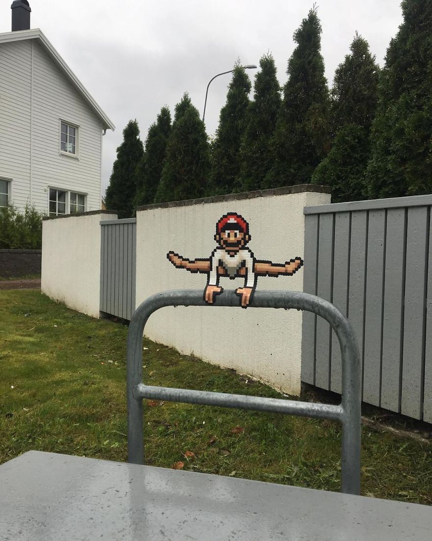 Someone Is ‘Vandalising’ Streets With Pixel Art, And The Result Is Awesome Someone Is ‘Vandalising’ Streets With Pixel Art, And The Result Is Awesome