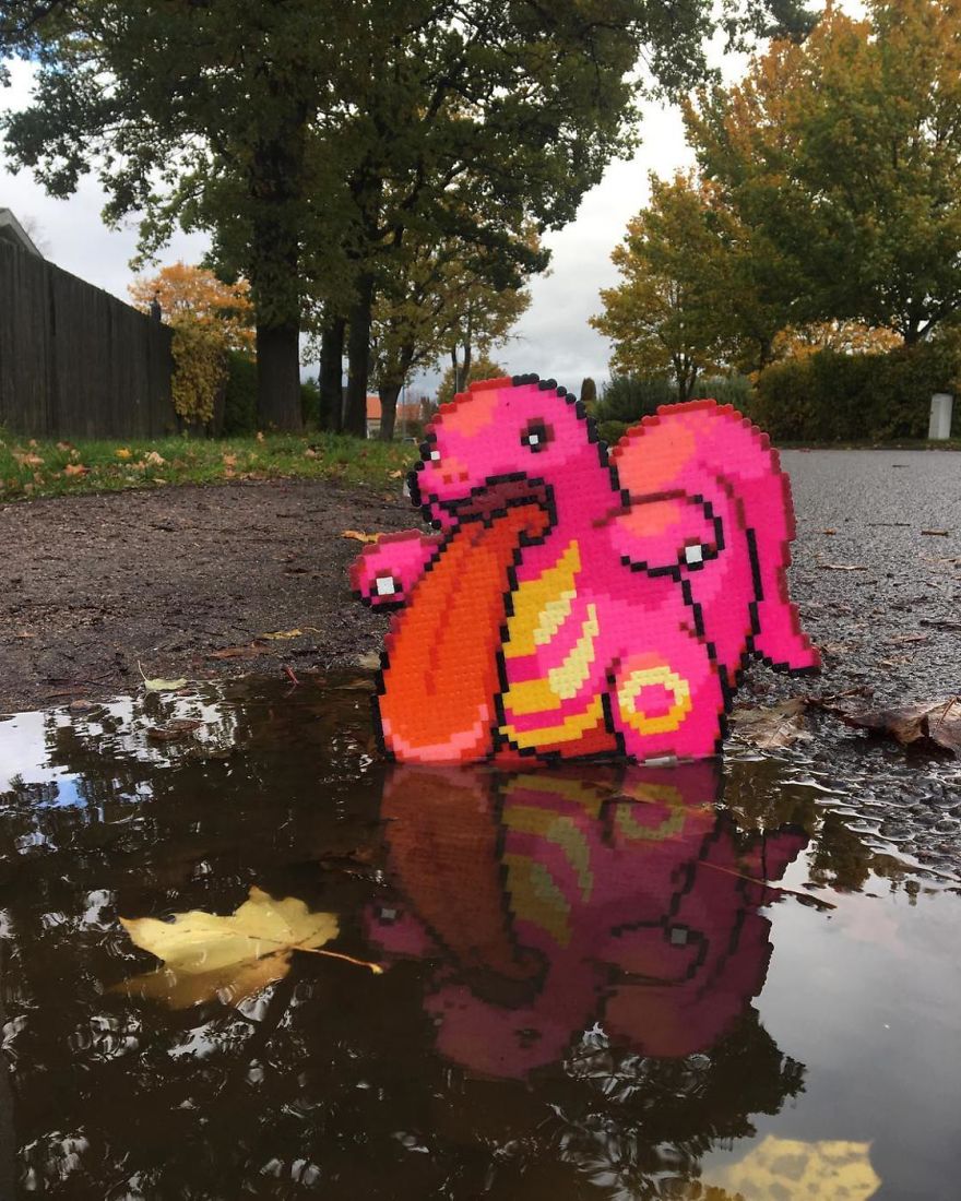 Someone Is ‘Vandalising’ Streets With Pixel Art, And The Result Is Awesome Someone Is ‘Vandalising’ Streets With Pixel Art, And The Result Is Awesome