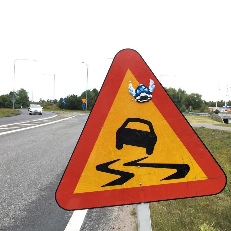 Someone Is ‘Vandalising’ Streets With Pixel Art, And The Result Is Awesome Someone Is ‘Vandalising’ Streets With Pixel Art, And The Result Is Awesome