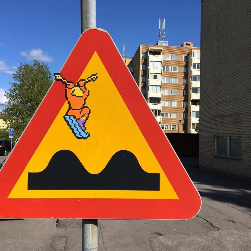 Someone Is ‘Vandalising’ Streets With Pixel Art, And The Result Is Awesome Someone Is ‘Vandalising’ Streets With Pixel Art, And The Result Is Awesome