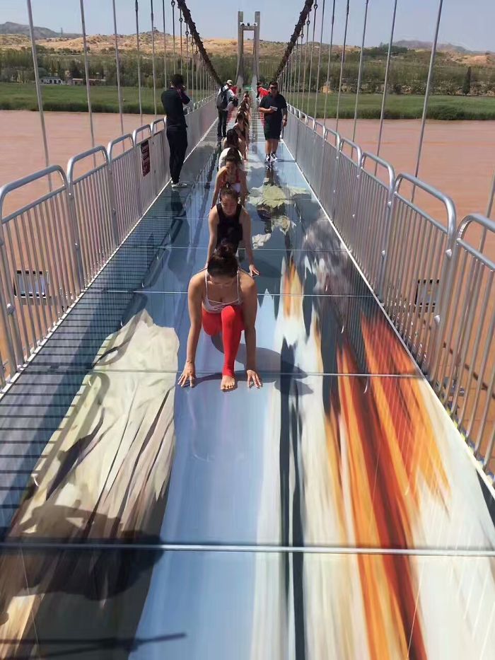 The Glass Bridge In China Will Amaze You With Optical Illusions Painted On The Ground