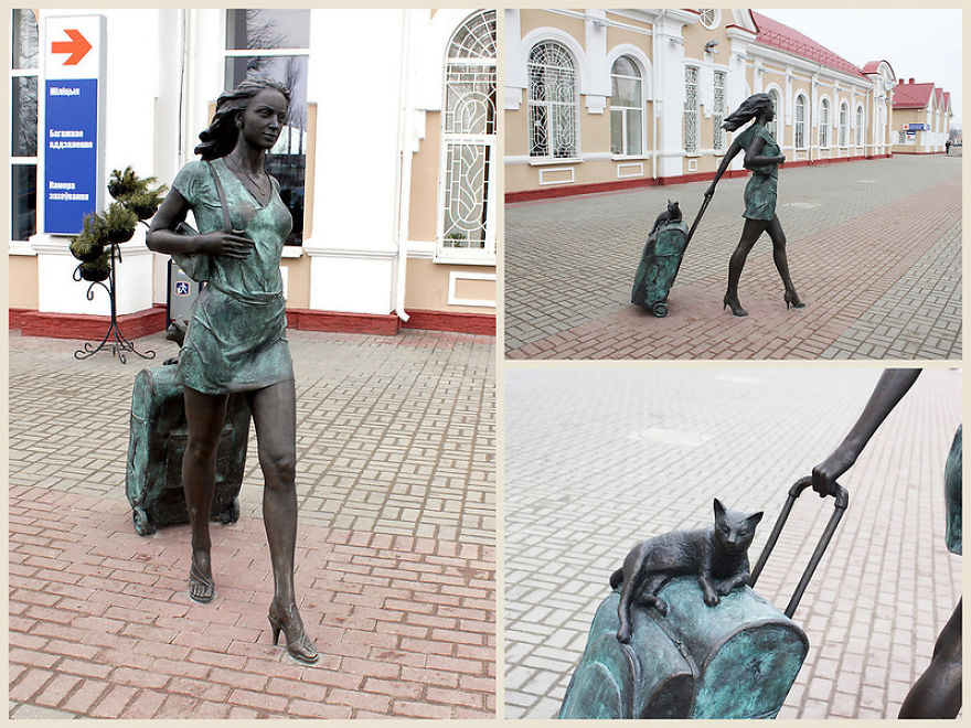 Sculpture Of Woman And Kitten Arriving On A Trip Leaves Its Inhabitants In Love