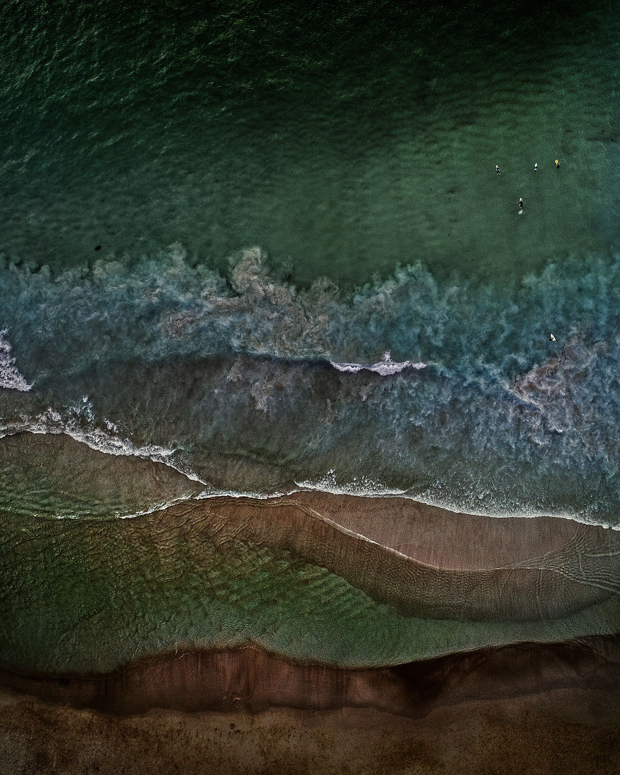 Drone Shots Of The Surfers On Llandudno Beach