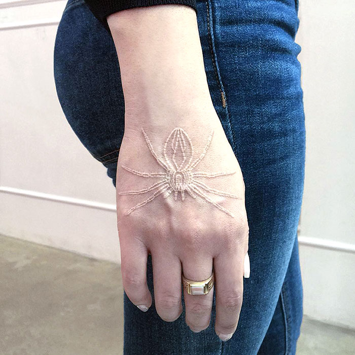 30 White Tattoo Designs That Look Like Magic Runes