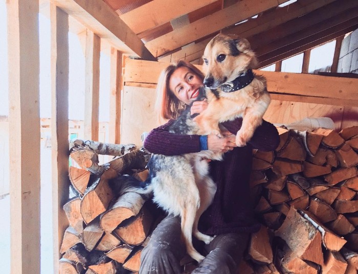 Famous Russian Photographer Ends Her Career To Live In A Forest With 100 Sick Dogs