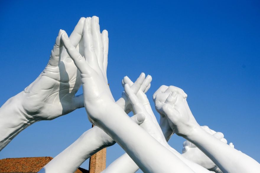 Giant Hands Reaching For Each Other Becomes The Newest Monumental Sculpture In Venice