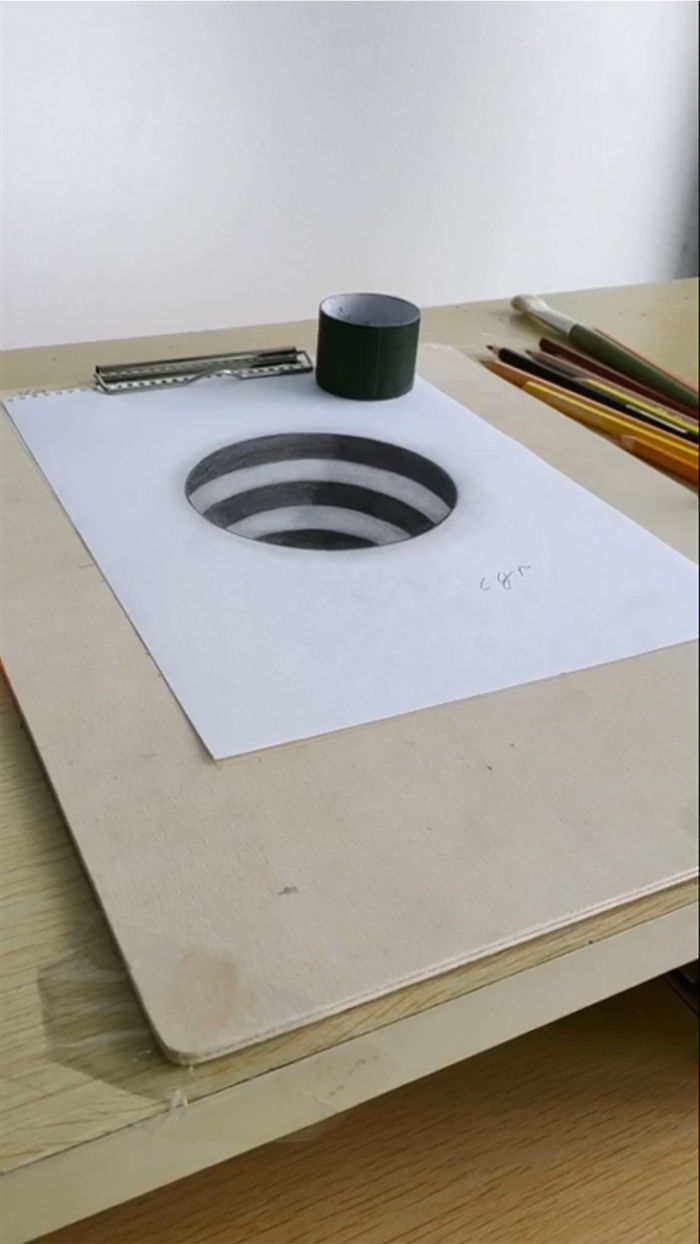 Artist Creates 3D Illusions On Simple Sheets Of Paper Artist Creates 3D Illusions On Simple Sheets Of Paper