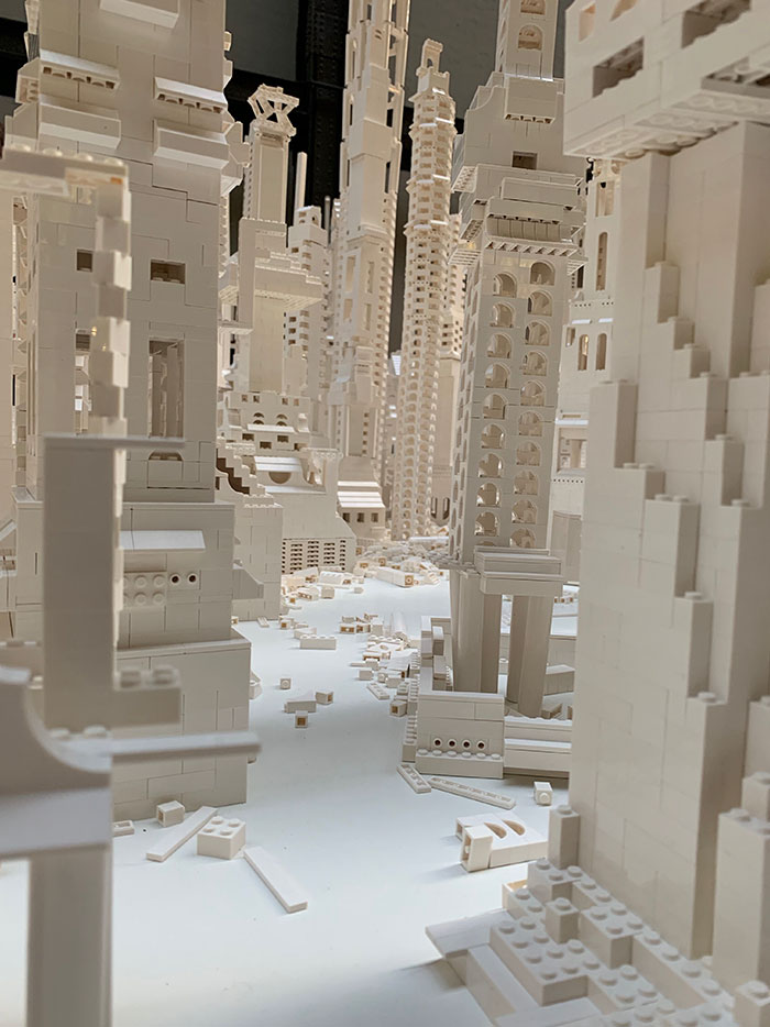 A City Is Being Built With White Lego Pieces And Everyone Can Join The Process