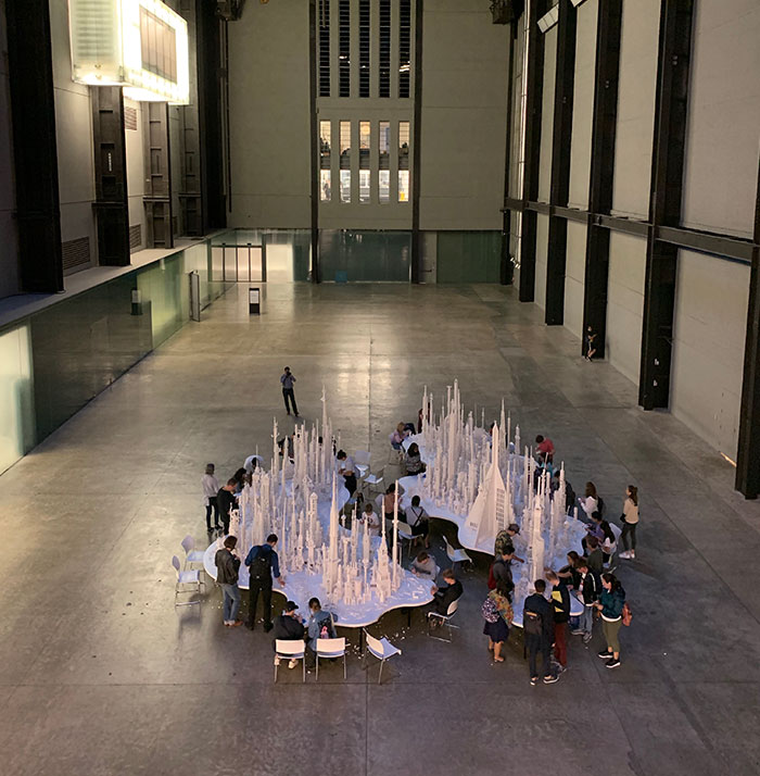 A City Is Being Built With White Lego Pieces And Everyone Can Join The Process