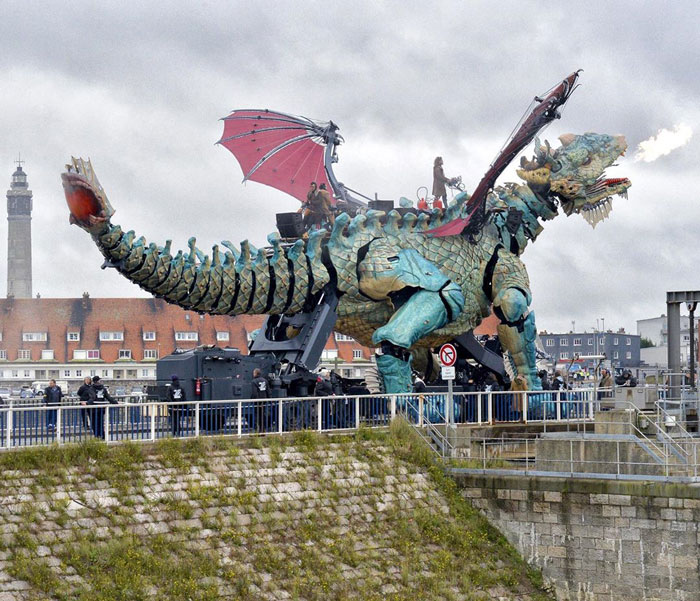 The Citizens Of Calais Witnessed A 25-Meter-Long Fire-Breathing Mechanical Dragon Manned By 17 People