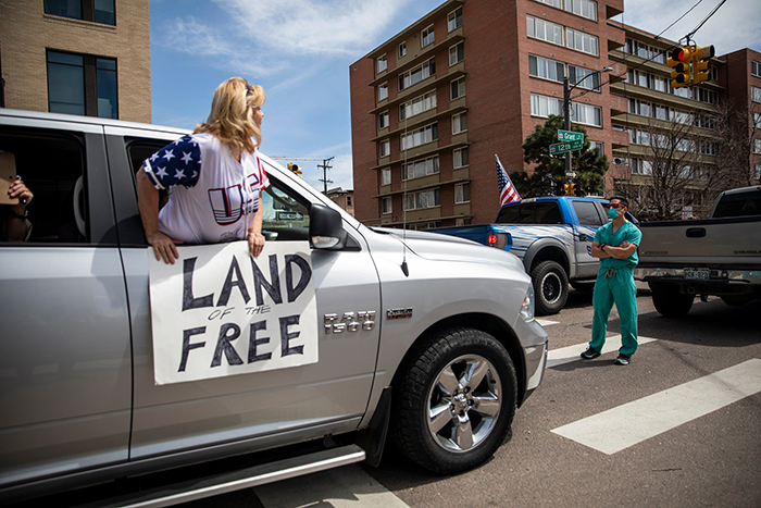 Medical Workers In Denver, Colorado Block Quarantine Protesters Medical Workers In Denver, Colorado Block Quarantine Protesters