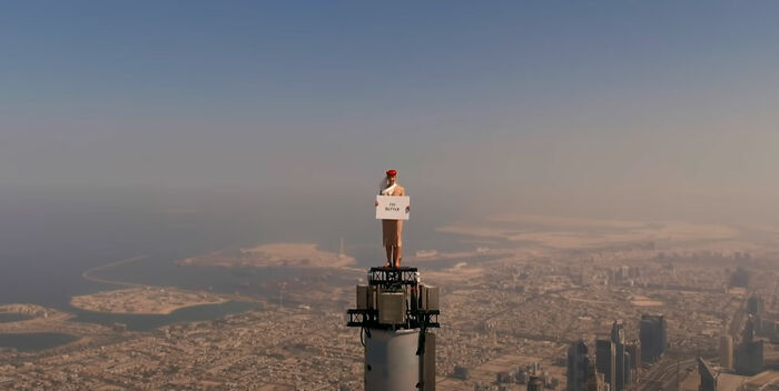 Emirates Ad Of A ‘Flight Attendant’ Standing On Top Of Burj Khalifa Is As Real As It Could Get As Airline Reveals How It Was Shot Emirates Ad Of A ‘Flight Attendant’ Standing On Top Of Burj Khalifa Is As Real As It Could Get As Airline Reveals How It Was Shot