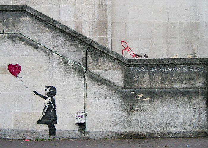 Banksy Fans Stunned As Artist “Confirms” Name In Resurfaced Interview Banksy Fans Stunned As Artist “Confirms” Name In Resurfaced Interview