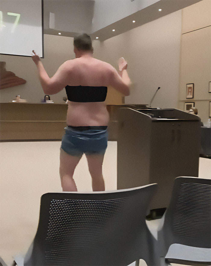 “These Are My Babies”: Dad Strips Down At School Board Meeting To Make A Point On Dress Code “These Are My Babies”: Dad Strips Down At School Board Meeting To Make A Point On Dress Code