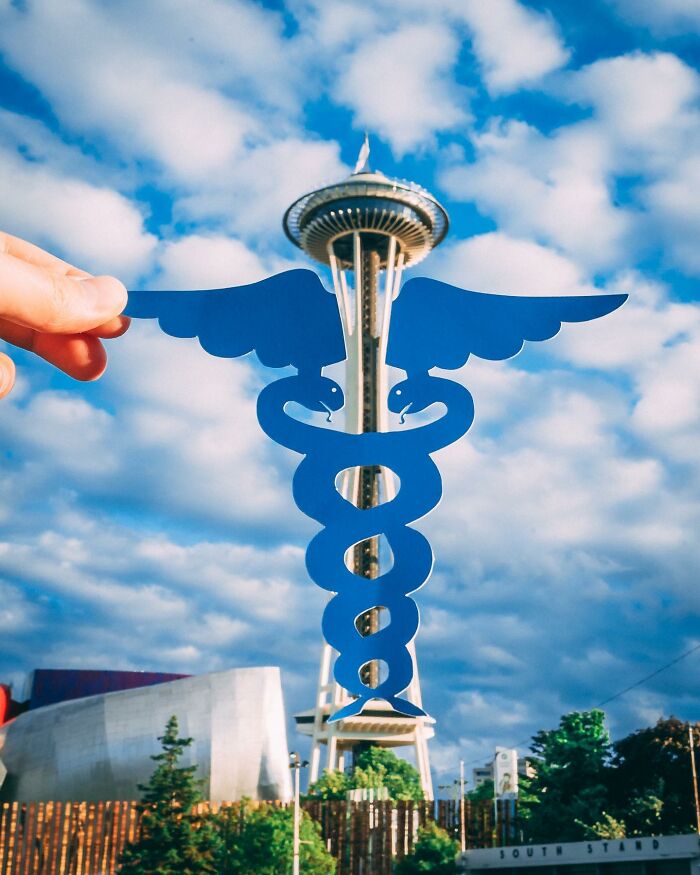 Street Artist Plays With His Surroundings And Paper Cutouts To Create Fun Scenes (26 New Pics) Street Artist Plays With His Surroundings And Paper Cutouts To Create Fun Scenes (26 New Pics)