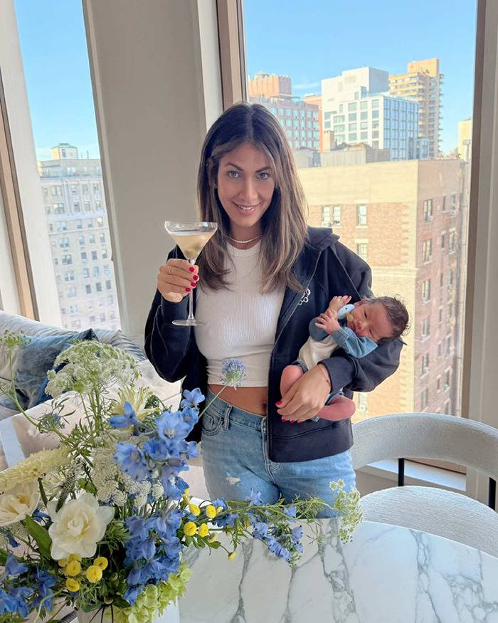 “Put This Child In A Safer Home”: Mom Slammed For “Dangling” Newborn Baby While Making A Martini