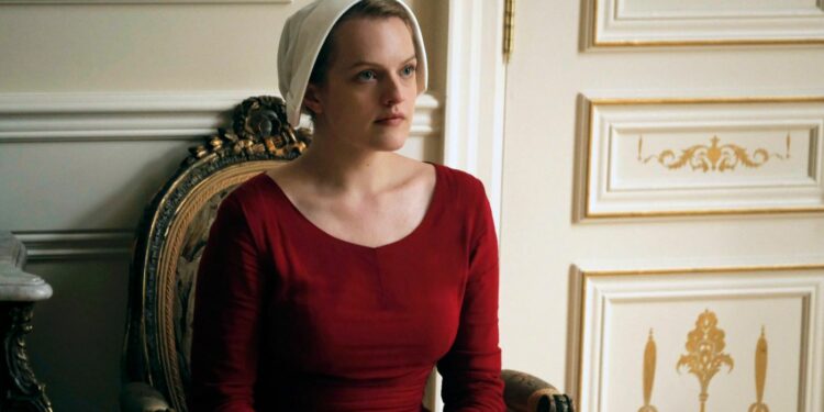 Elisabeth Moss as Offred Elisabeth Moss as Offred