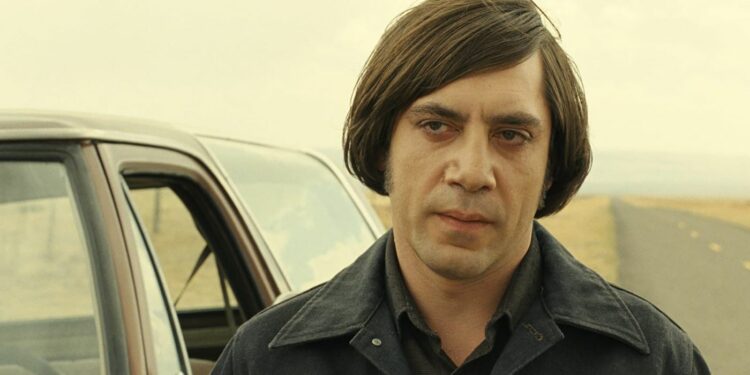 javier bardem standing with a car javier bardem standing with a car