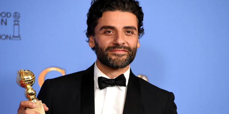 Oscar Isaac with his first Golden Globe award Oscar Isaac with his first Golden Globe award