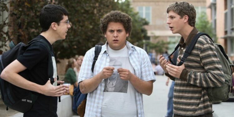 three boys having a discussion