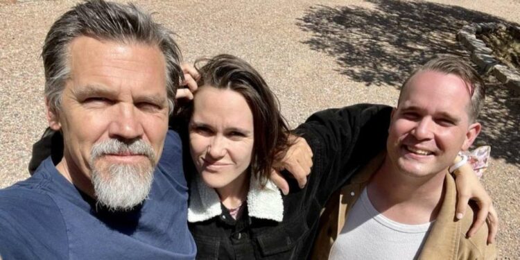 Trevor Brolin with his sister and his father