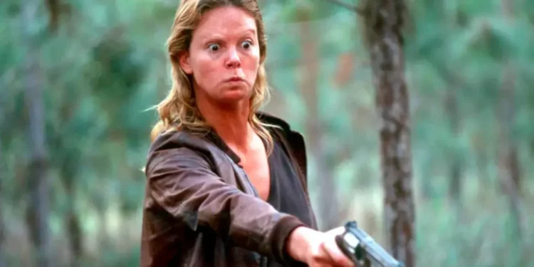 a lady aiming a revolver a lady aiming a revolver