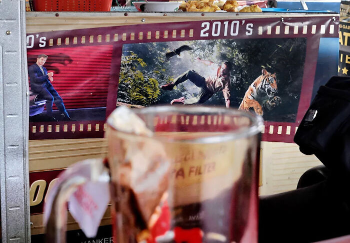 This Photographer Captured 40 Street Shots So Perfectly Timed, You Might Need To Do A Double Take