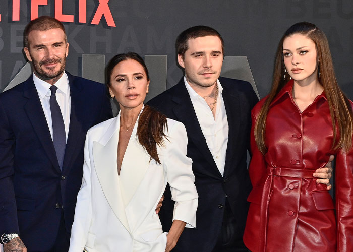 Clip Of Nicola Peltz Being Pulled Into Beckham Family Photo Resurfaces After Brooklyn&rsquo;s Claims