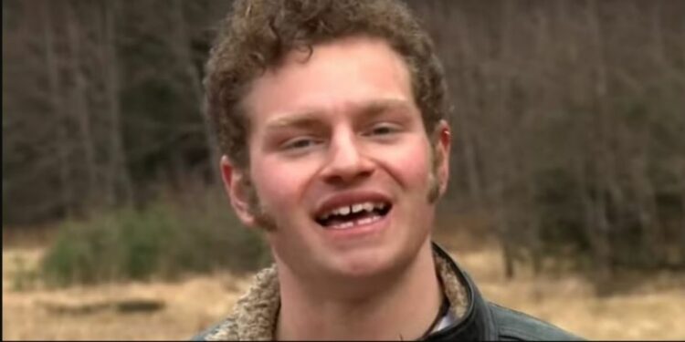 Gabriel Brown in front of a jungle