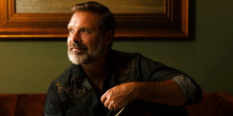 Mac Powell posing for an image