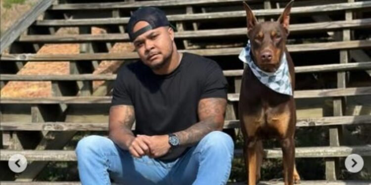 Suave Xavier with his pet dog