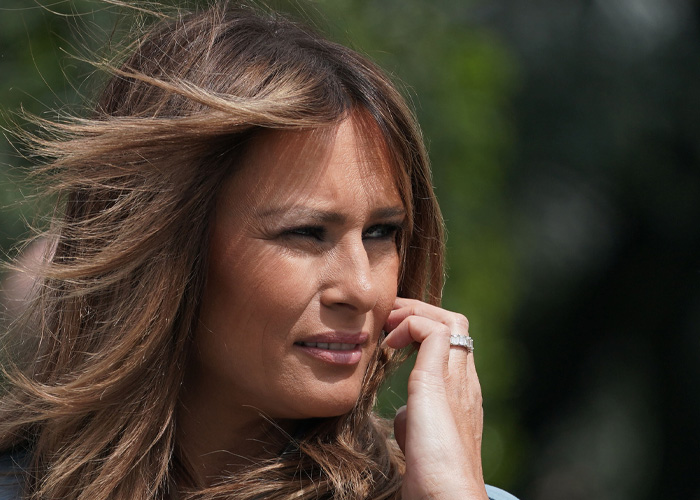 Melania Trump&rsquo;s Perfectly Polished Appearance Slips As The Wind Uncovers A Hidden Secret
