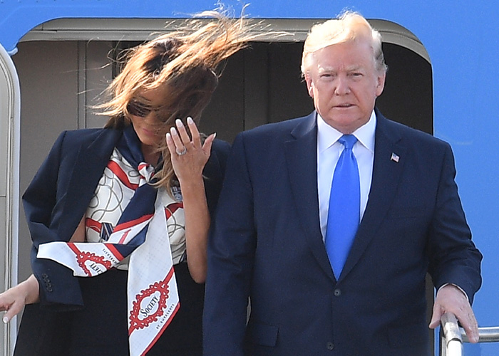 Melania Trump&rsquo;s Perfectly Polished Appearance Slips As The Wind Uncovers A Hidden Secret